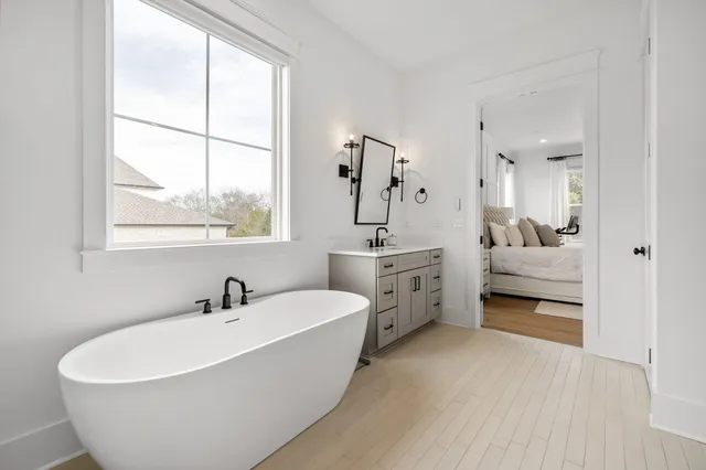 a view of house with yard outdoor seating and barbeque oven