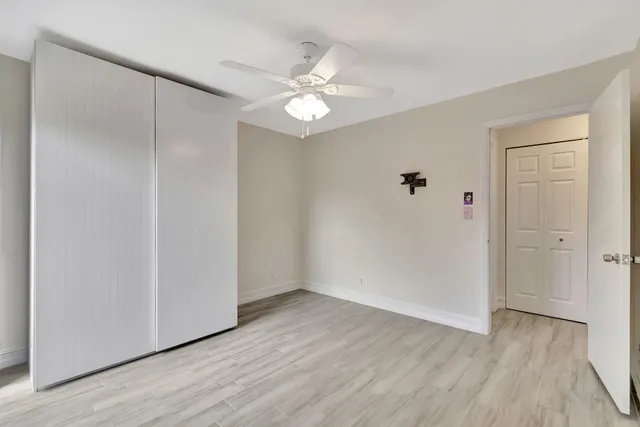 a view of a livingroom with wooden floor