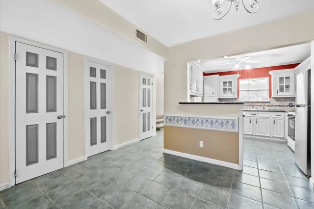 a view of a kitchen with a sink