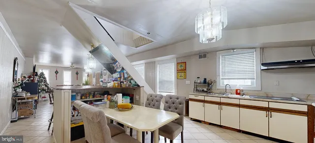 a view of living room with furniture and a window