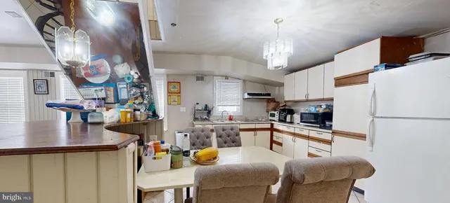 a view of hallway with furniture