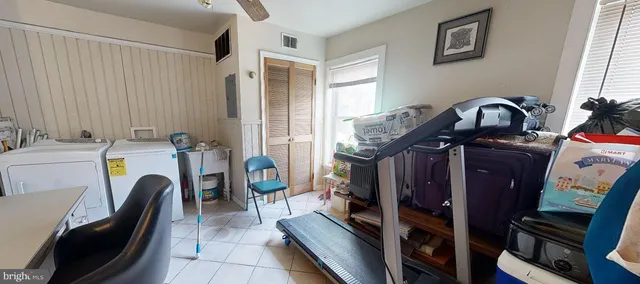 a bathroom with a sink and vanity