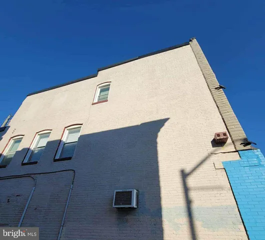 a car parked in front of a building