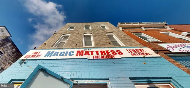 a view of a building along the street