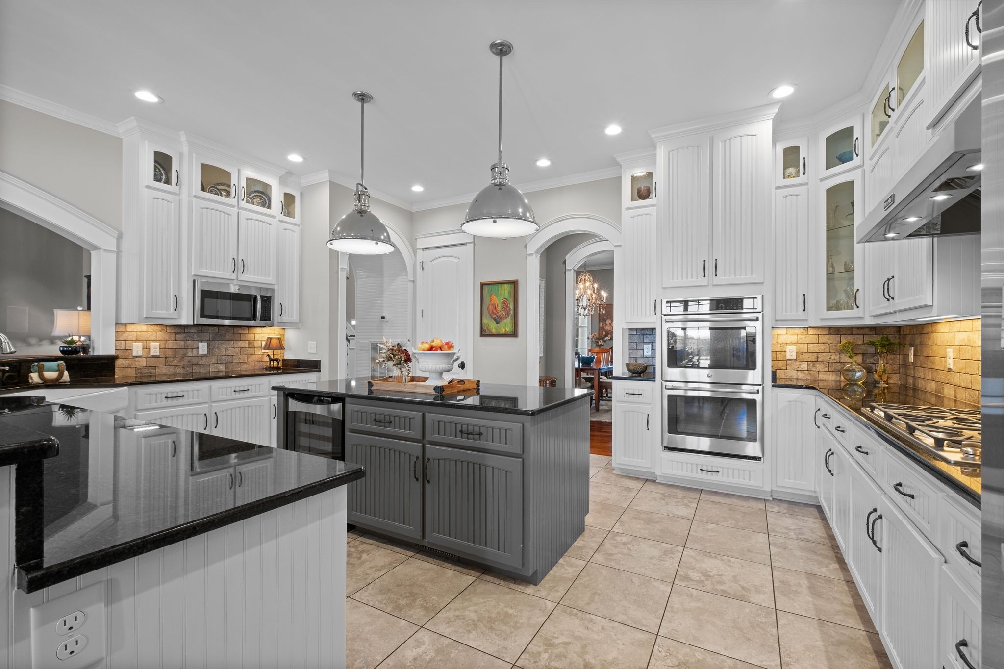 1421 Lawrence Lane Springfield, TN 37172 - Photo 22 of 43 a kitchen with stainless steel appliances granite countertop a sink and cabinets