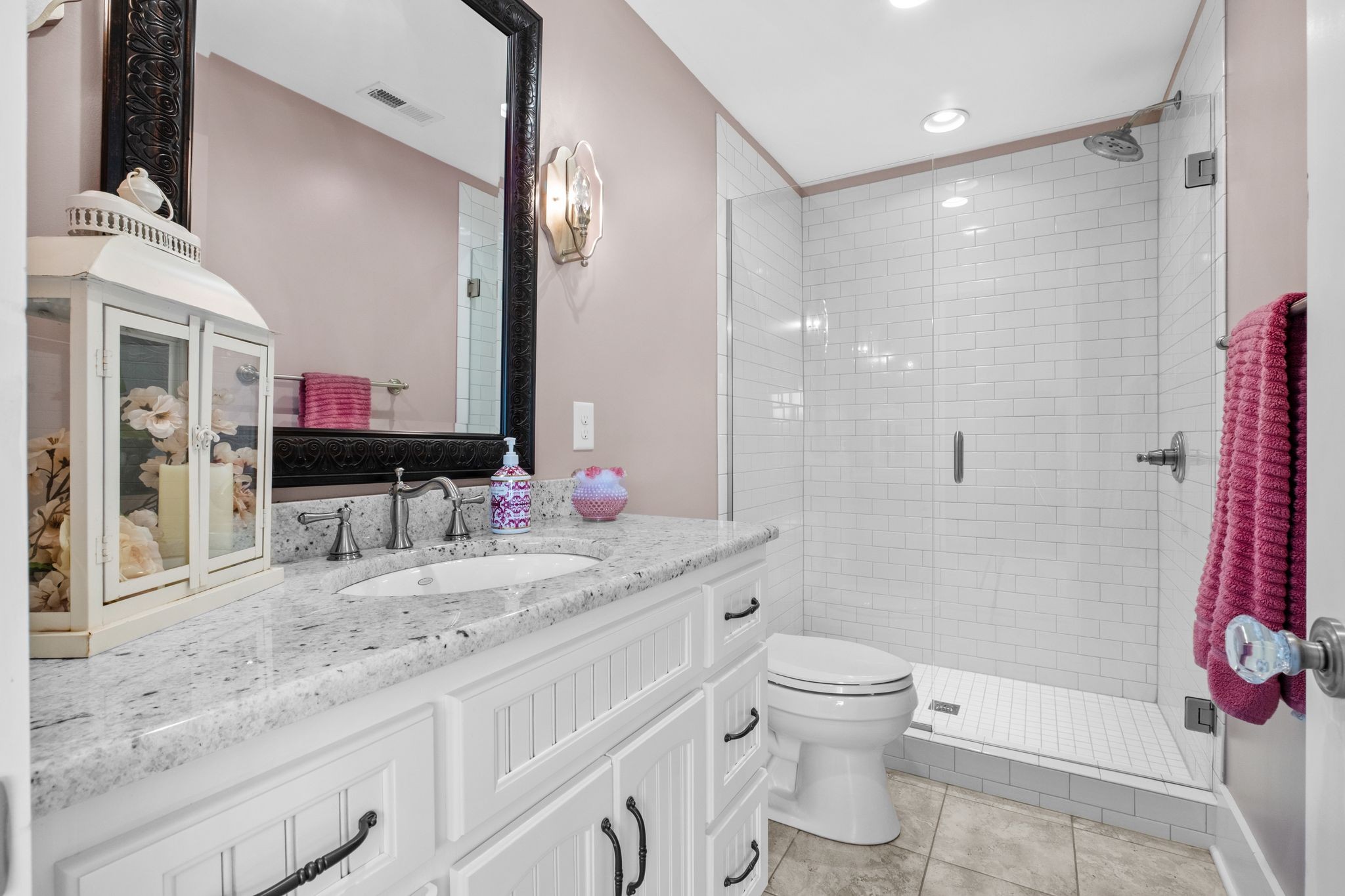 1421 Lawrence Lane Springfield, TN 37172 - Photo 27 of 43 a bathroom with a granite countertop sink toilet mirror and shower
