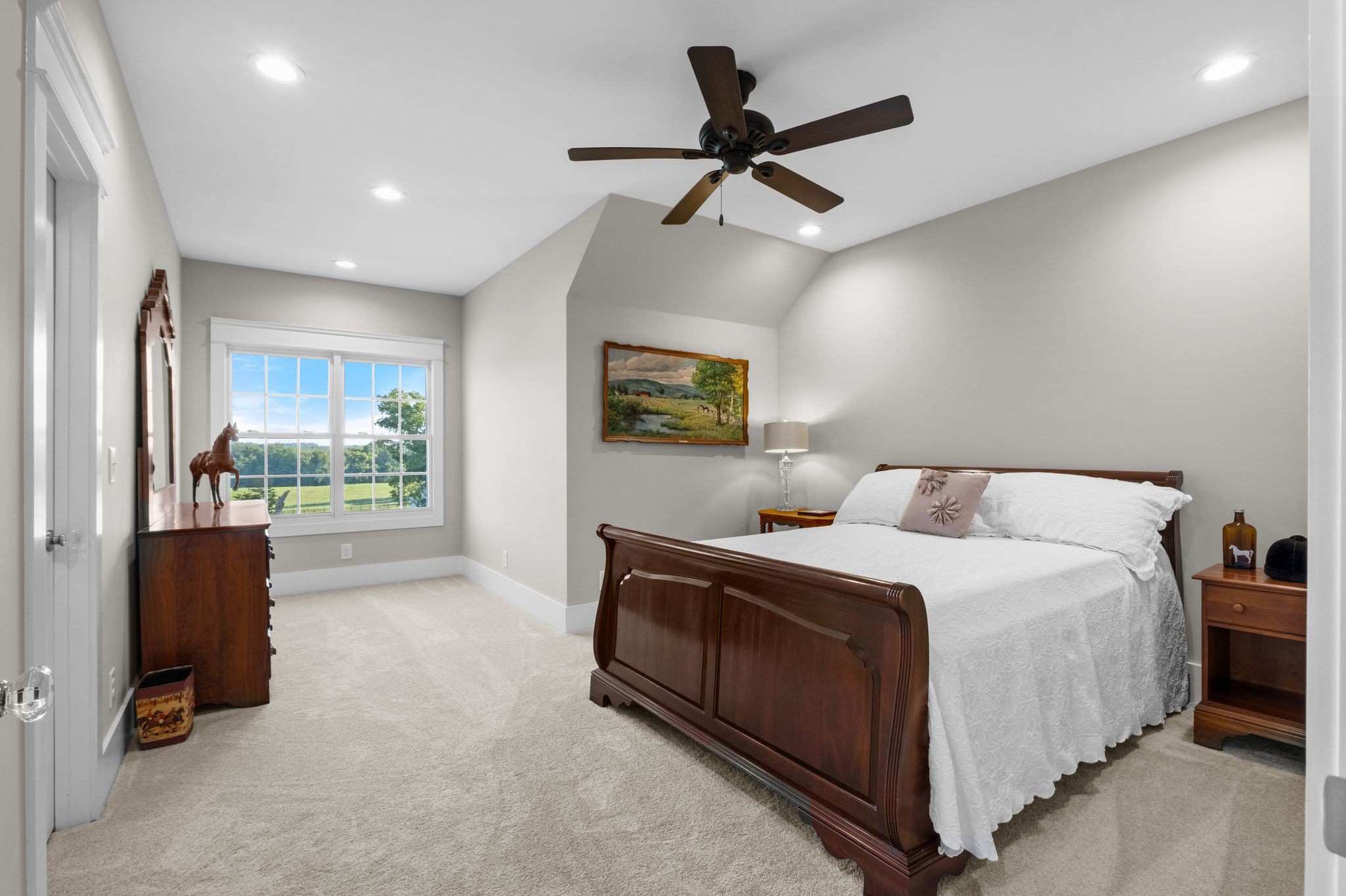 1421 Lawrence Lane Springfield, TN 37172 - Photo 29 of 43 a bedroom with a bed and a chandelier