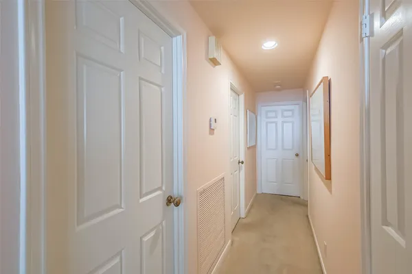 a kitchen with a sink a stove and cabinets