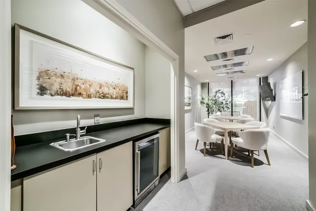 a view of a livingroom with furniture and window