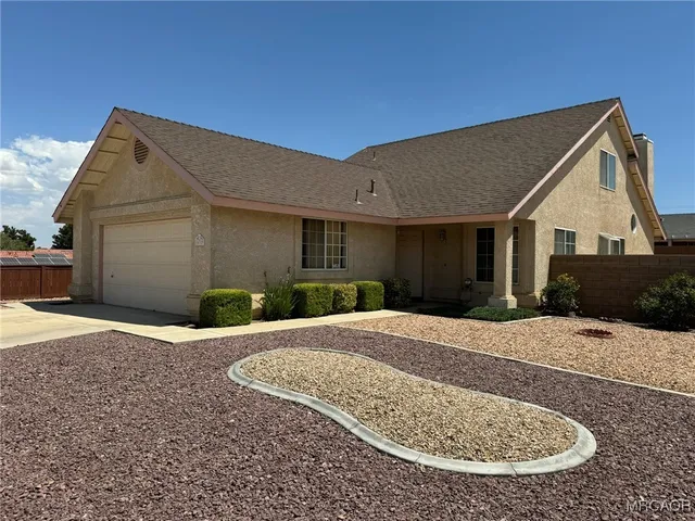 a view of a house with a patio