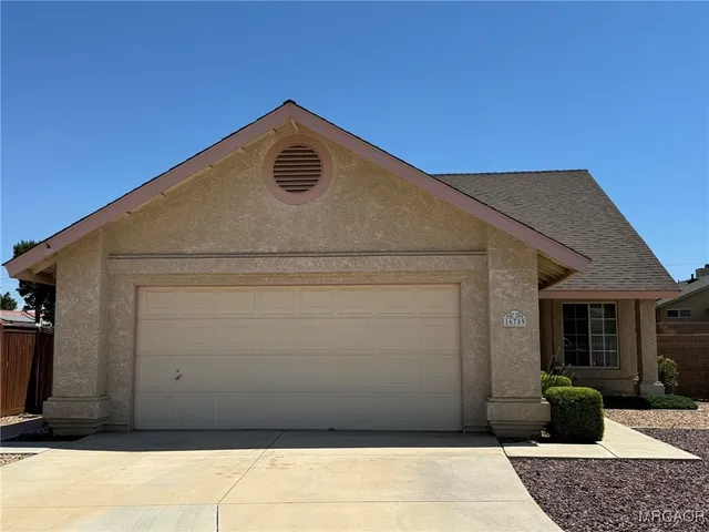 a front view of a house with patio