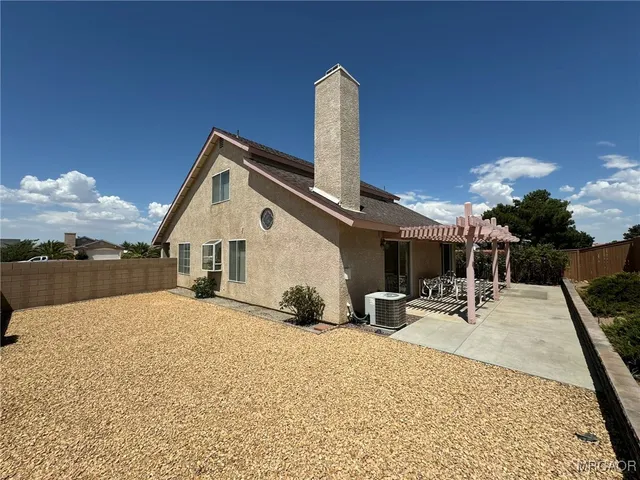a room with gym equipment and a table
