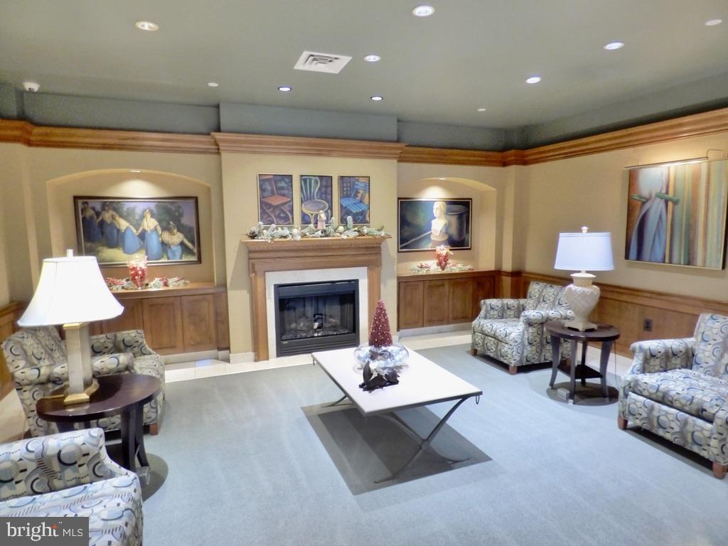 11800 Sunset Hills Road, Unit 118 Reston, VA 20190 - Photo 38 of 52 Cozy lounge with artistic flair.