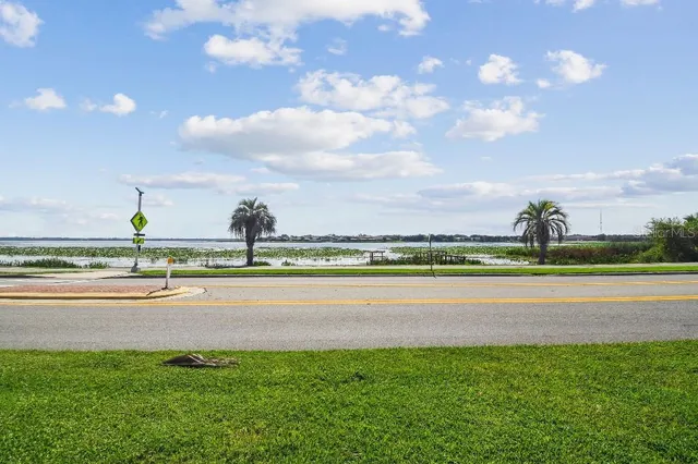 a view of an ocean and a mountain