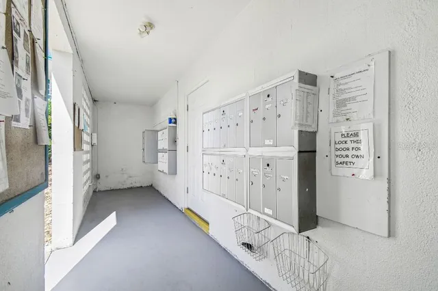 a view of kitchen with cabinets