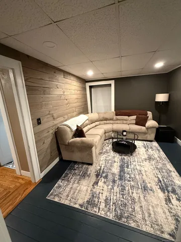 a view of hallway with wooden floor