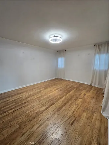 an empty room with a fireplace