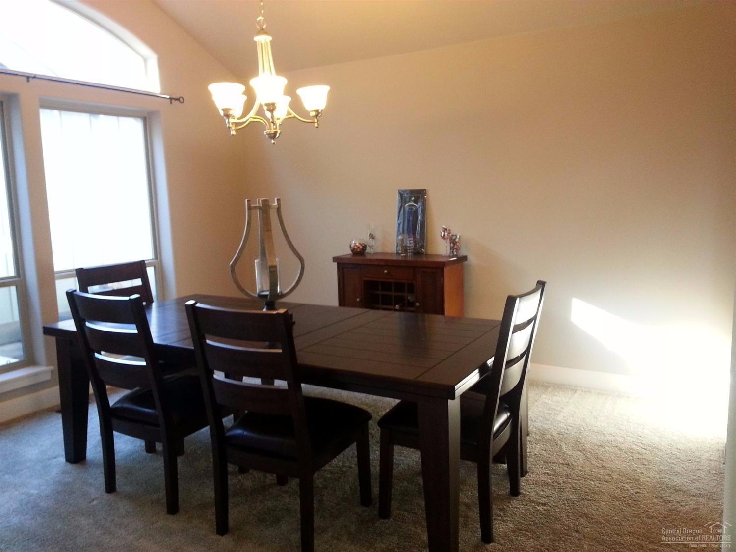 61754 Rigel Way Bend, OR 97702 - Photo 5 of 20 Bright formal dining room with vaulted c