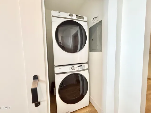 a view of a room with a ceiling fan