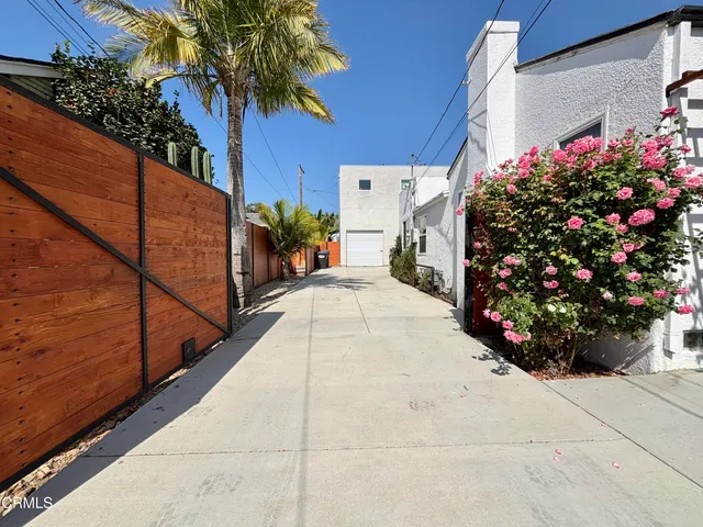 a view of a hallway with a chandelier