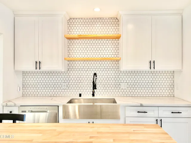 a bathroom with a bathtub and a sink