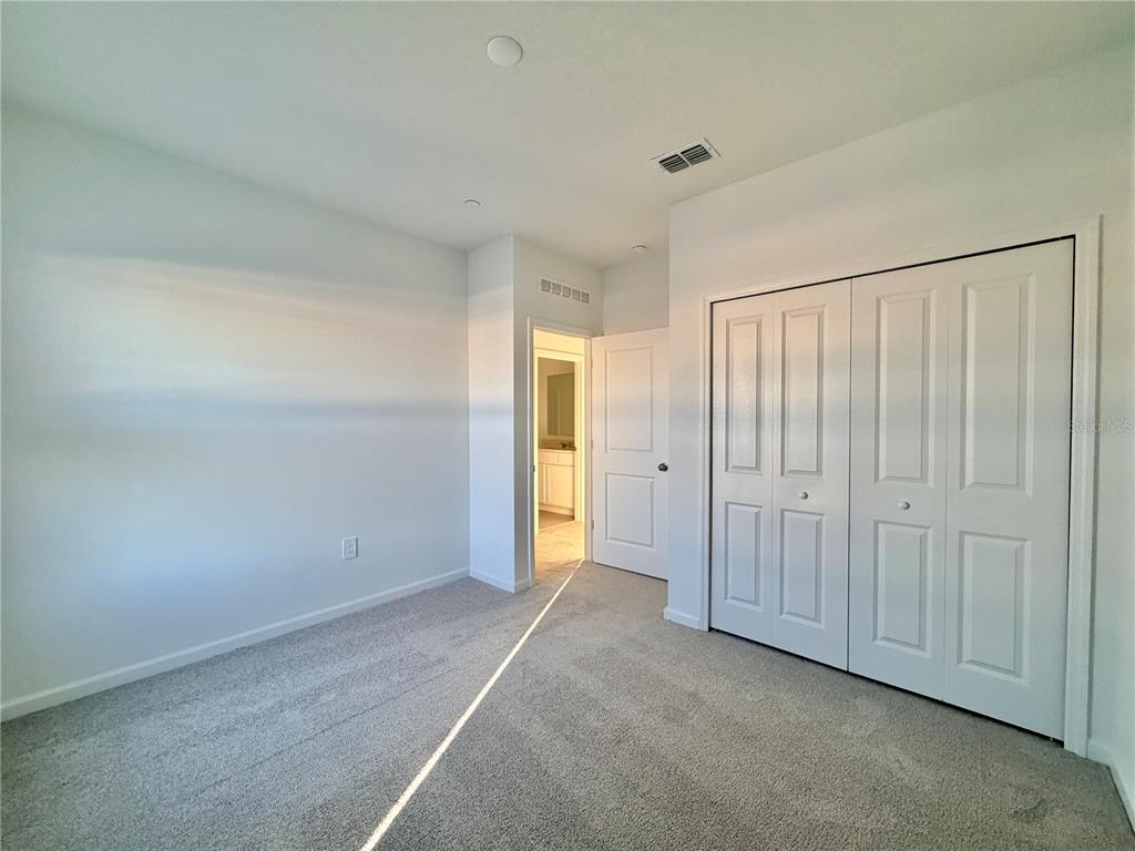 2348 Rider Rain Lane Apopka, FL 32703 - Photo 21 of 32 a view of an empty room