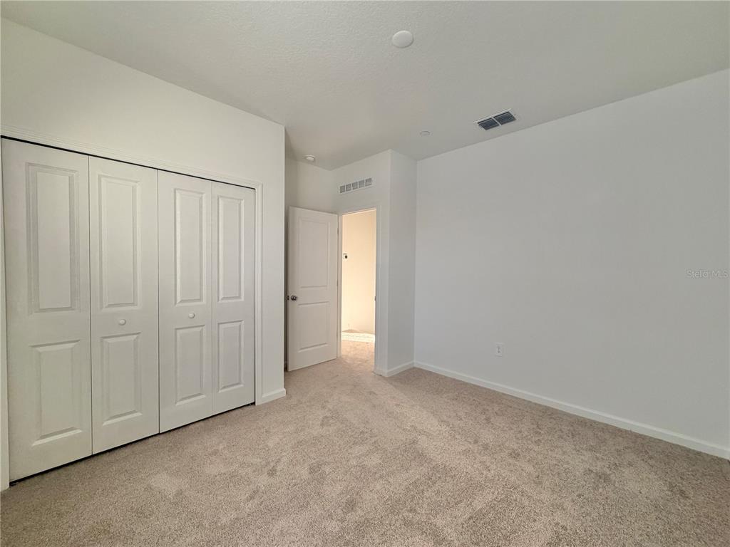 2348 Rider Rain Lane Apopka, FL 32703 - Photo 24 of 32 a view of an empty room