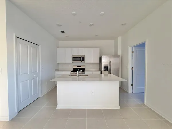 a utility room with washer and dryer