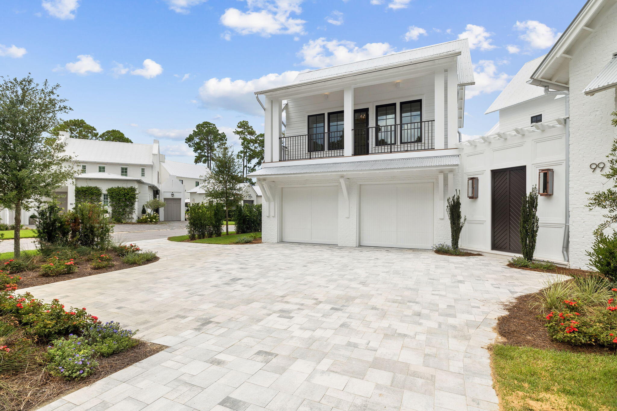 99 Perrin Santa Rosa Beach, FL 32459 - Photo 102 of 149 a front view of a house with a yard and garage