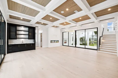 a view of a balcony with wooden floor