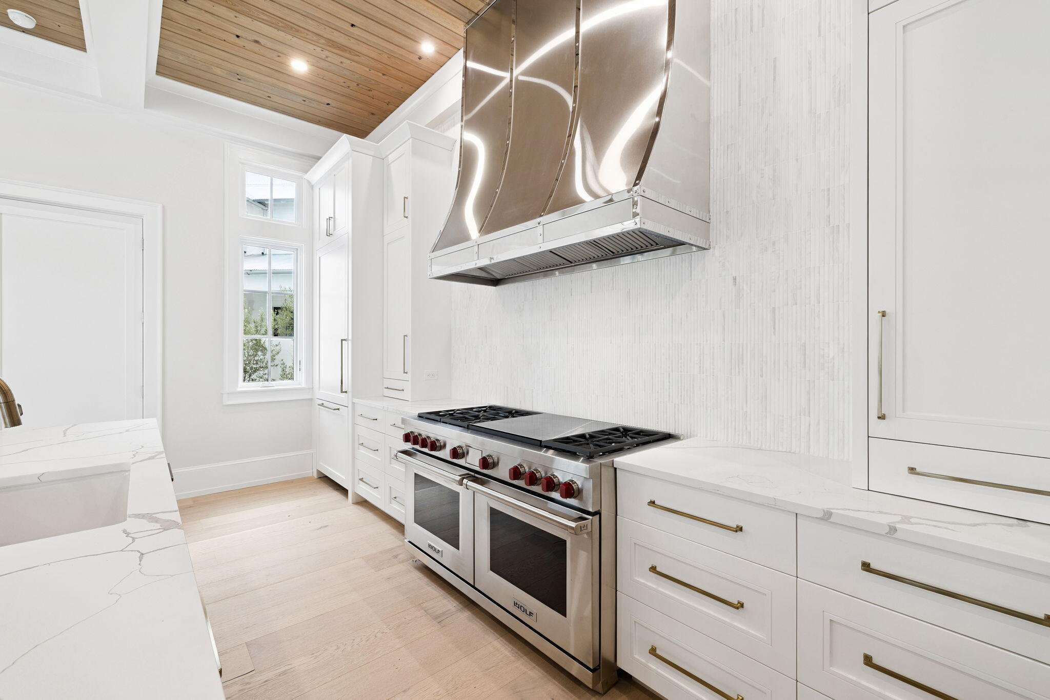 99 Perrin Santa Rosa Beach, FL 32459 - Photo 23 of 149 a kitchen with white cabinets and appliances