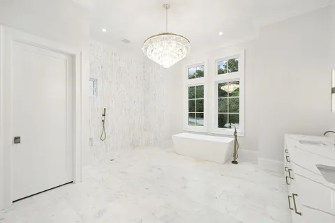 a swimming pool with outdoor seating and yard