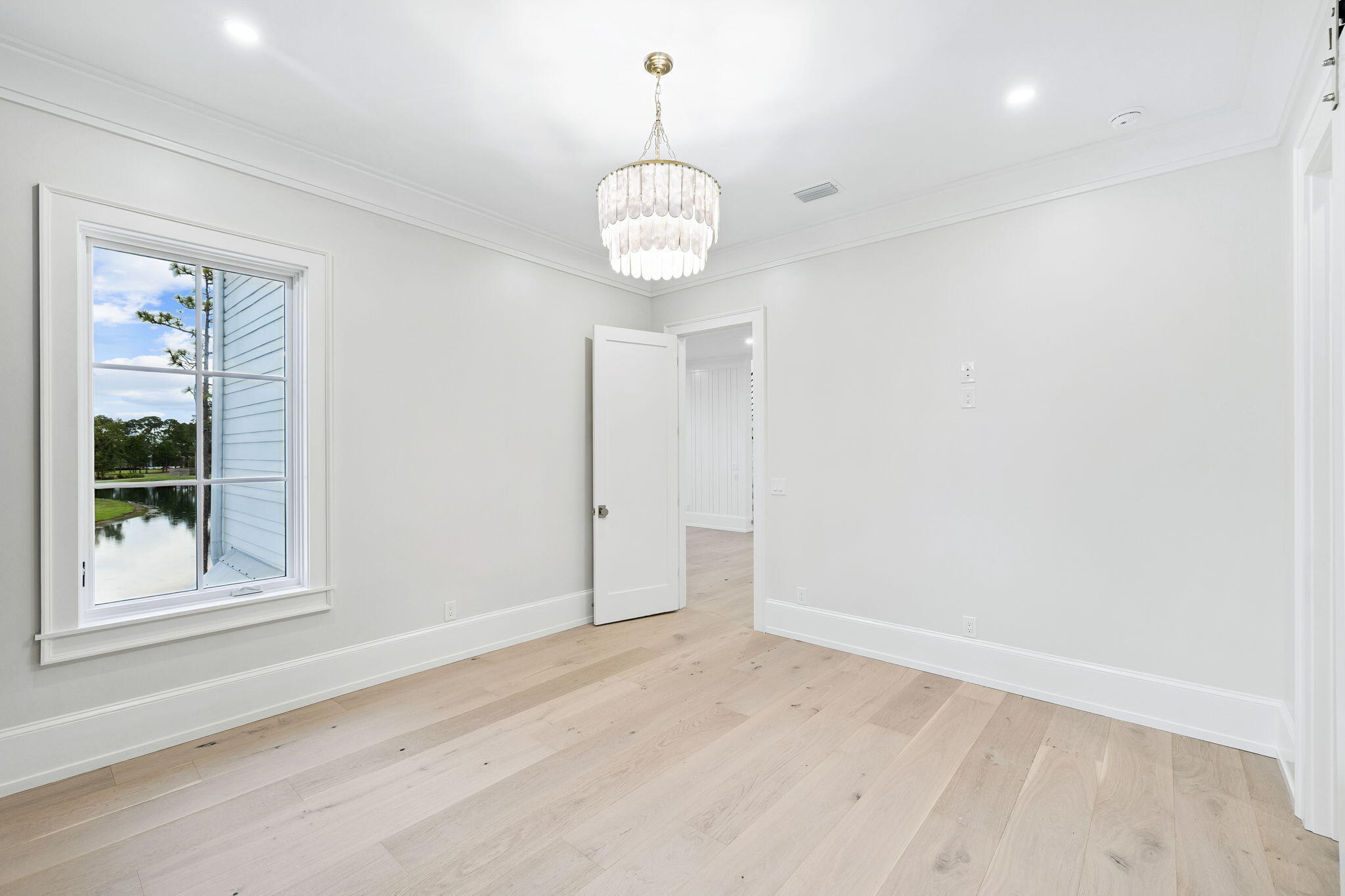 99 Perrin Santa Rosa Beach, FL 32459 - Photo 56 of 149 an empty room with wooden floor and windows