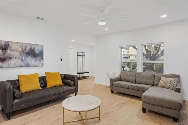 a living room with furniture and a couch