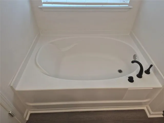 a bathroom with a bathtub
