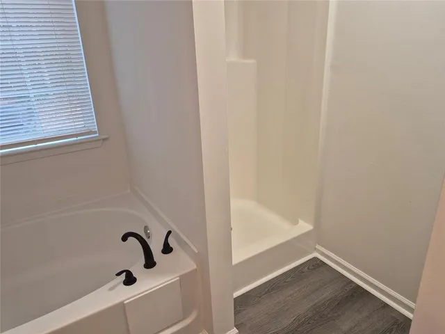 a bathroom with a bathtub