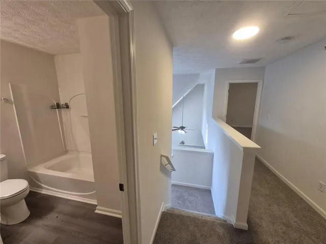 a view of a house with backyard