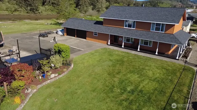 a aerial view of a house with garden