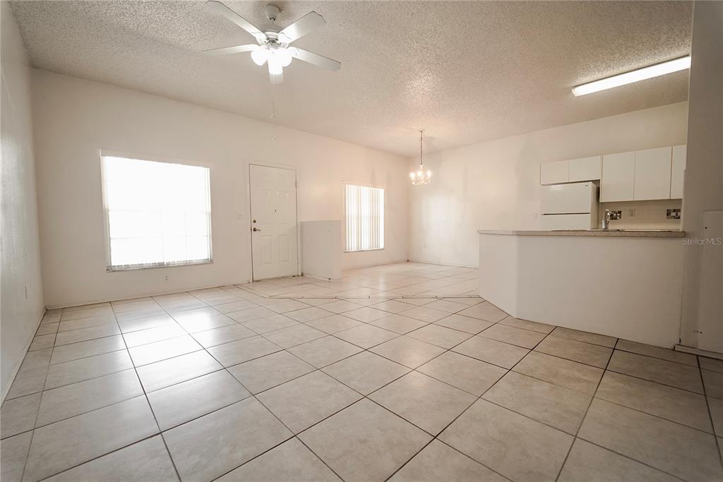 4150 Portillo Road, Unit 5 Spring Hill, FL 34608 - Photo 13 of 25 a view of a kitchen with a sink and cabinets