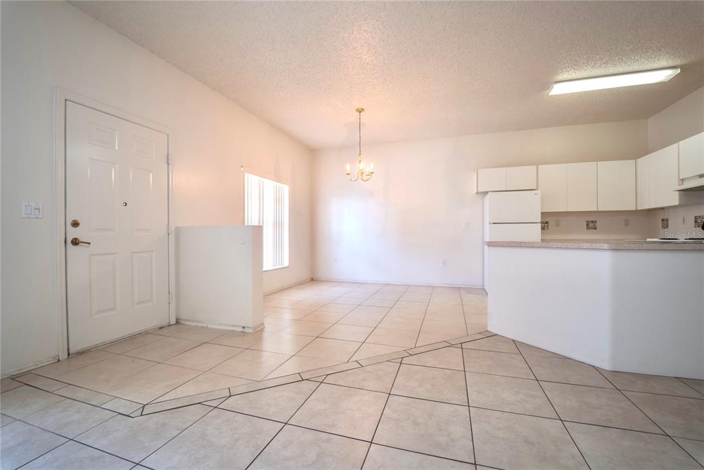 4150 Portillo Road, Unit 5 Spring Hill, FL 34608 - Photo 14 of 25 a view of a kitchen with a sink and cabinets