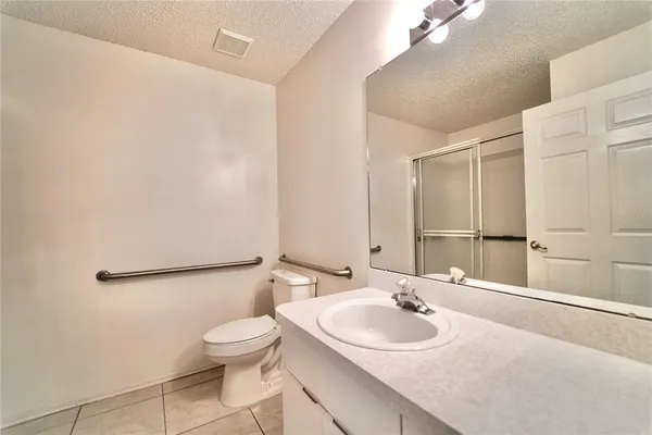 a bathroom with a sink and a toilet