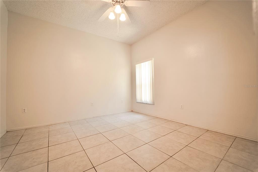 4150 Portillo Road, Unit 5 Spring Hill, FL 34608 - Photo 18 of 25 an empty room with a empty space and a window