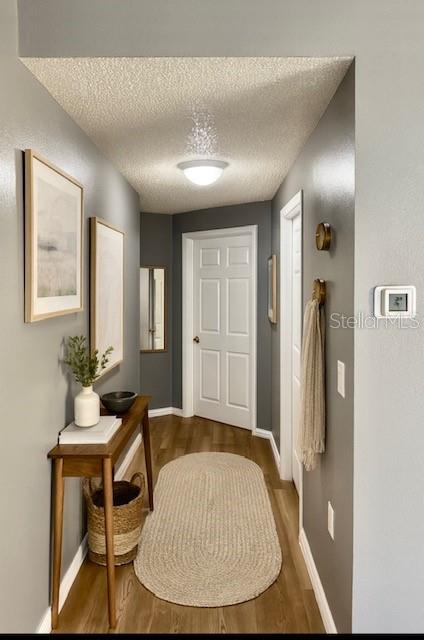 4150 Portillo Road, Unit 5 Spring Hill, FL 34608 - Photo 29 of 43 a living room with furniture and wooden floor