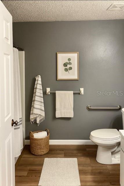 4150 Portillo Road, Unit 5 Spring Hill, FL 34608 - Photo 31 of 43 a bathroom with a toilet and a shower