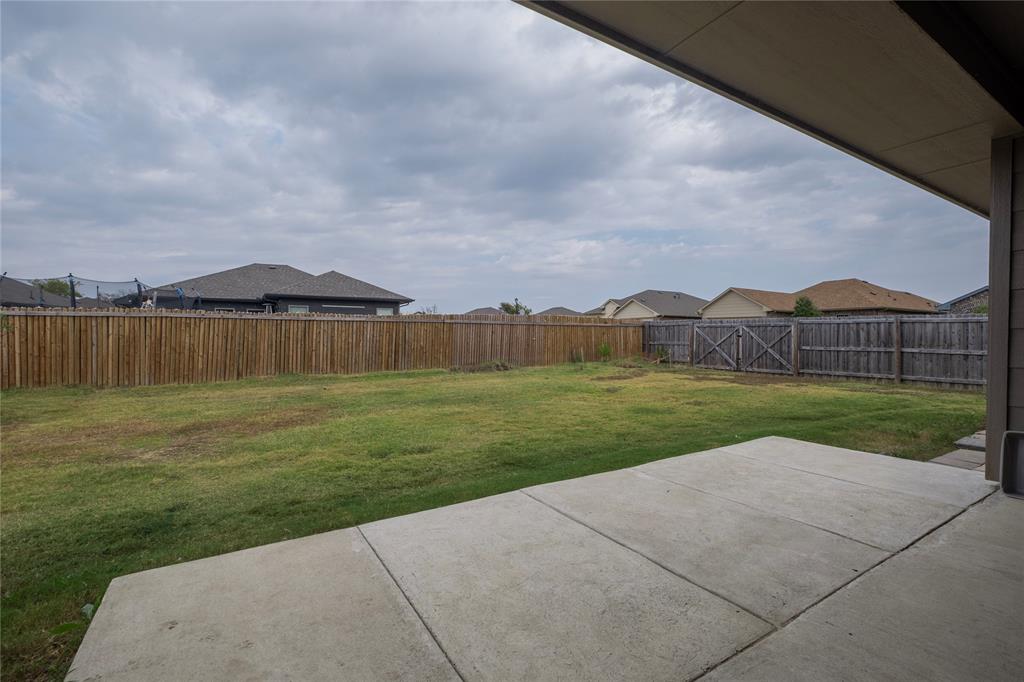 106 Spring Crest Street Mabank, TX 75147 - Photo 21 of 22 a view of a garden