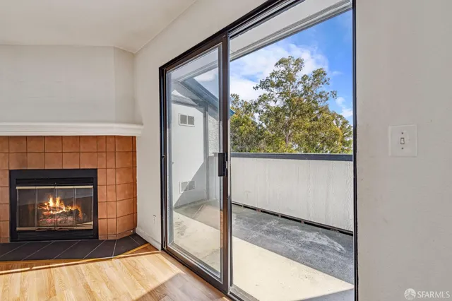 a view of an empty room and window