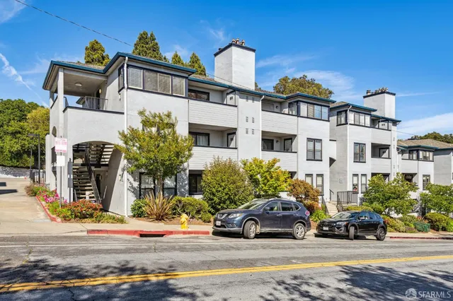 a car parked in front of a house