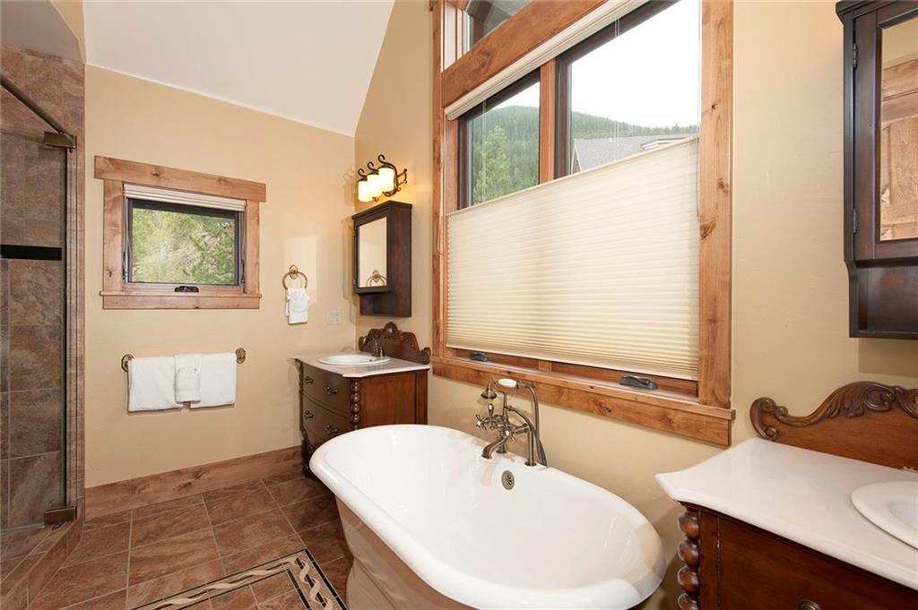 10 Wolf Rock Road Keystone, CO 80435 - Photo 13 of 25 a bathroom with a sink and a mirror