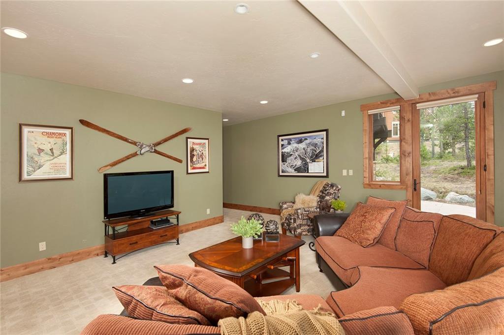 10 Wolf Rock Road Keystone, CO 80435 - Photo 16 of 25 a living room with furniture and a flat screen tv