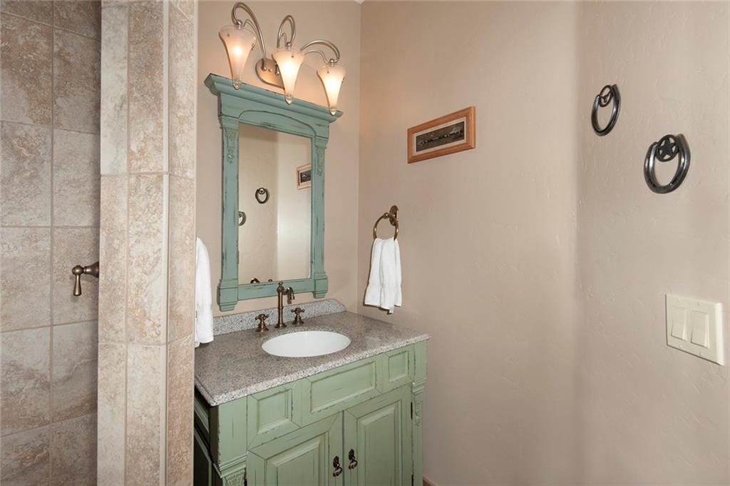 10 Wolf Rock Road Keystone, CO 80435 - Photo 18 of 25 a bathroom with a sink and a mirror